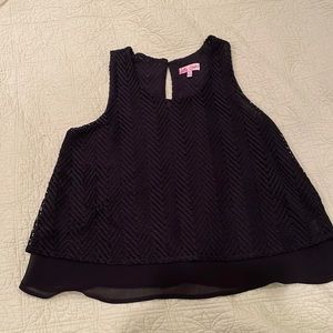Candies lace tank, comfortable breathable polyester. Washable and dryer safe